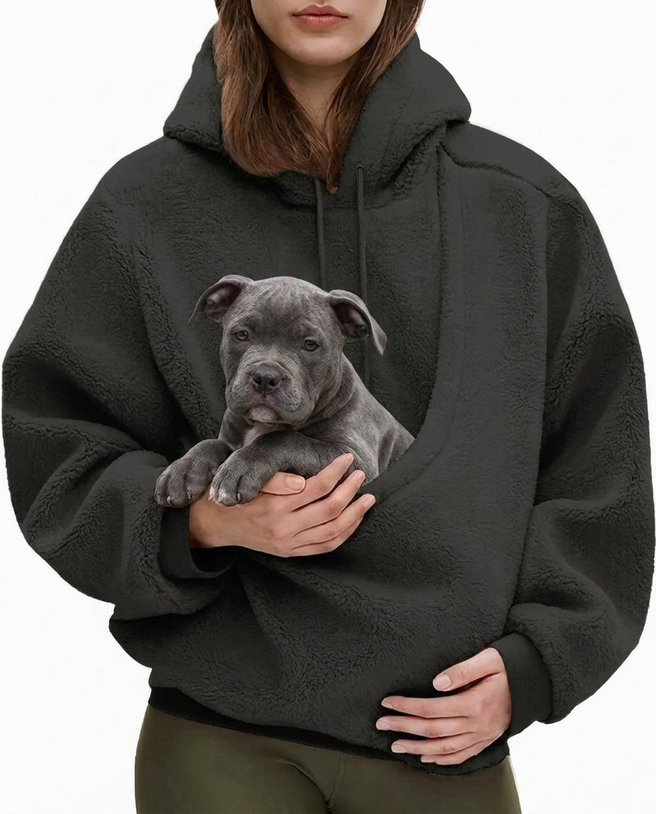 Black JOEY pouch hoodie worn with a grey Bully puppy sitting in the front pouch